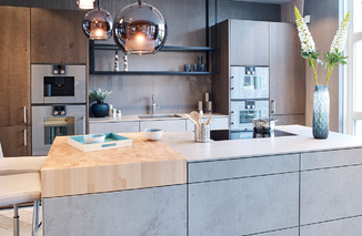 Foto: next125 design keuken betonlook en hout tieleman keukens 3