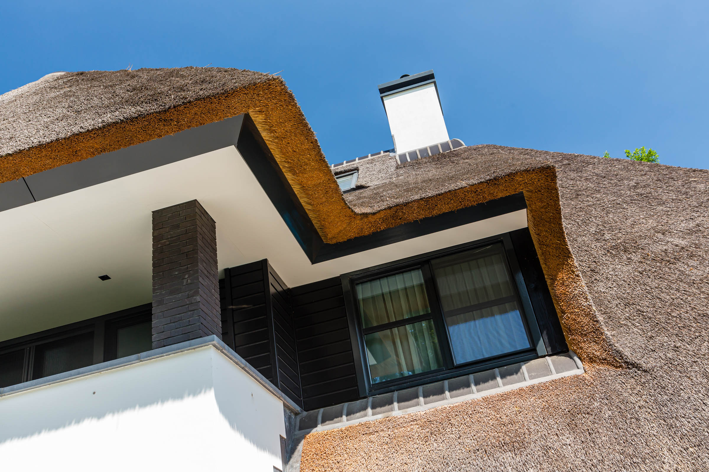 Foto: Hoe uw uw rieten dak goed onderhoudt   Lichtenberg Exclusieve Villabouw  2  2