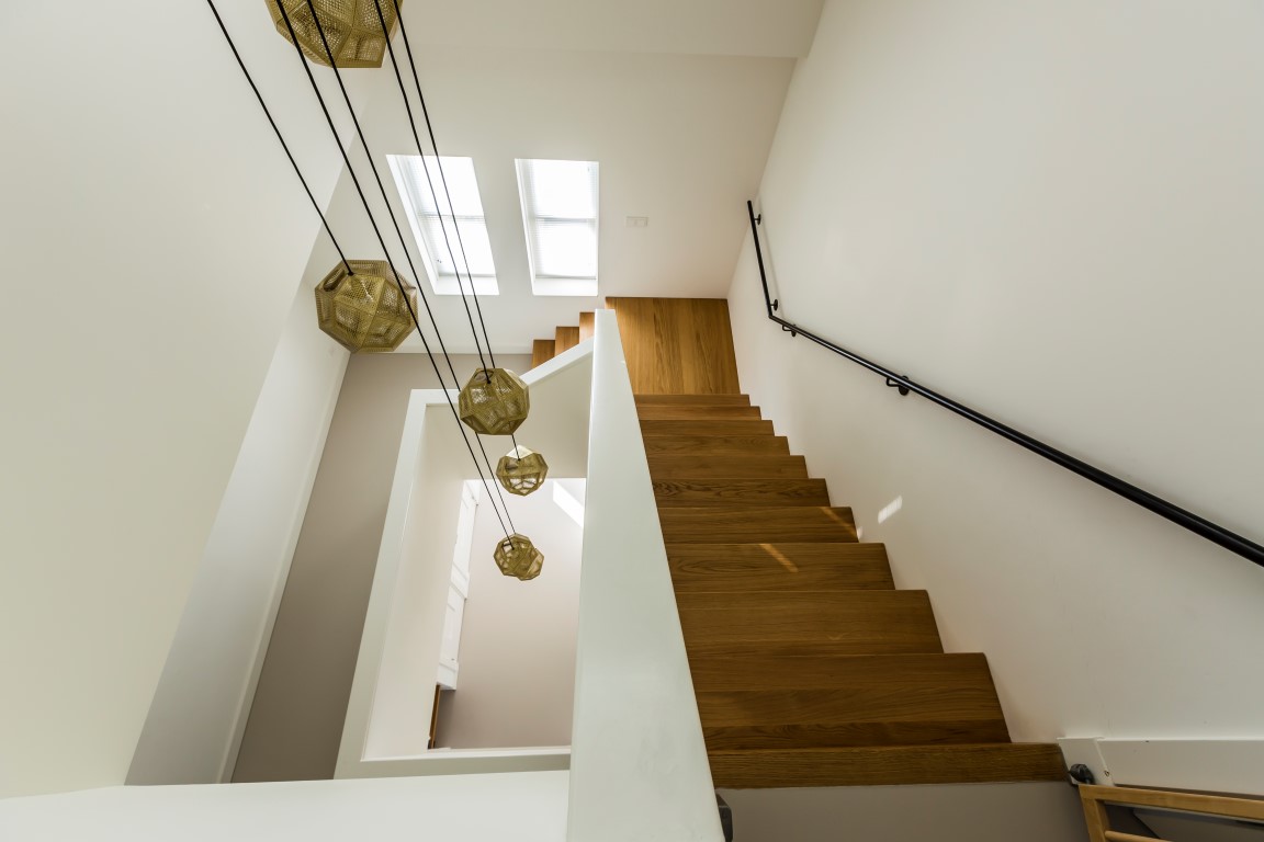 Foto: Villa bouwen   Houten trap met vide   Lichtenberg Exclusieve Villabouw