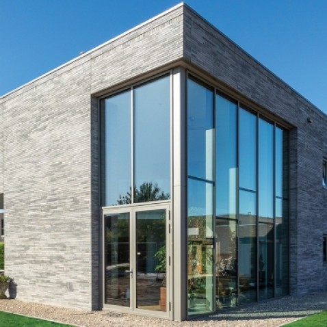 Foto : Gordijngevels: Vorm én Functie Vervlochten