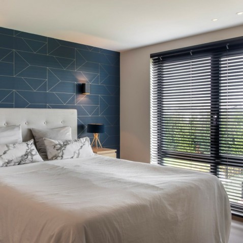 Foto : Creëer een hotel chique slaapkamer met raamdecoratie