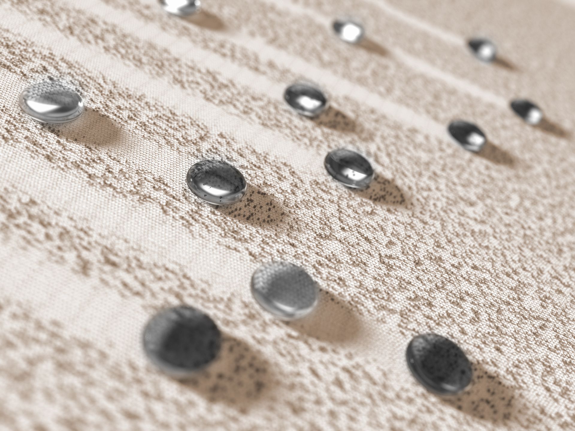 Foto: detailopname van een zonweringdoek waar water vanaf loopt