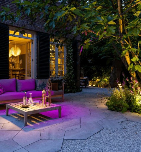 Foto : Tuinverlichting: zo geef je jouw tuin ook ’s avonds sfeer