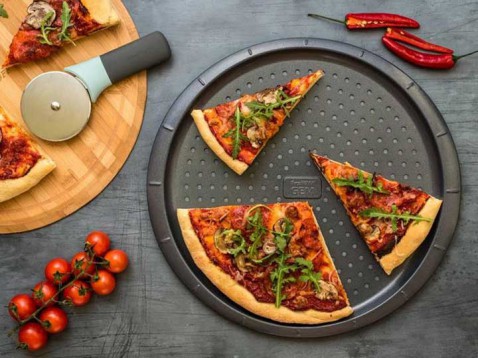 Foto : Onderzoek comfort food trend: homemade pizza & pasta, gezelligheid en kookgerei