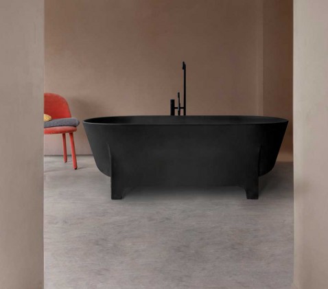 Foto : Stoerdere look voor je badkamer? Neem dan een wastafel of bad uit beton