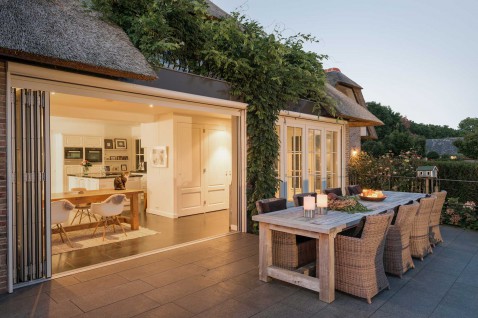 Foto : Van woonkamer naar tuin: zo creëer je een naadloze overgang met glas