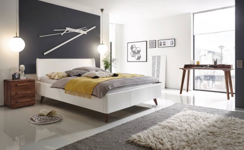 Foto : Een gestoffeerd bed van Hasena: zacht comfort en stijlvol design