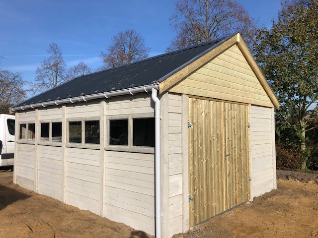 Foto : Garages in voordelige beton systeembouw constructie alleen mogelijk op stabiel blijvend terrein