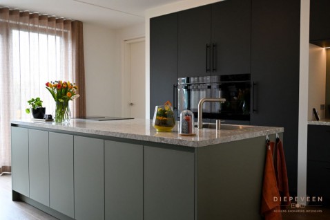 Foto : Groen en zwarte keuken