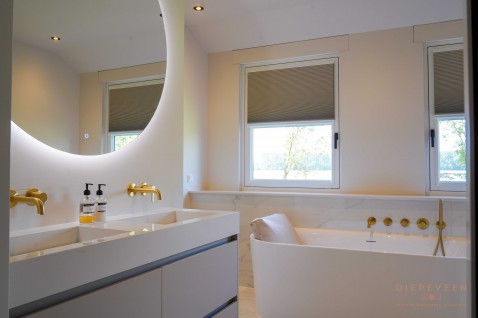 Foto : Chicque en elegante badkamer