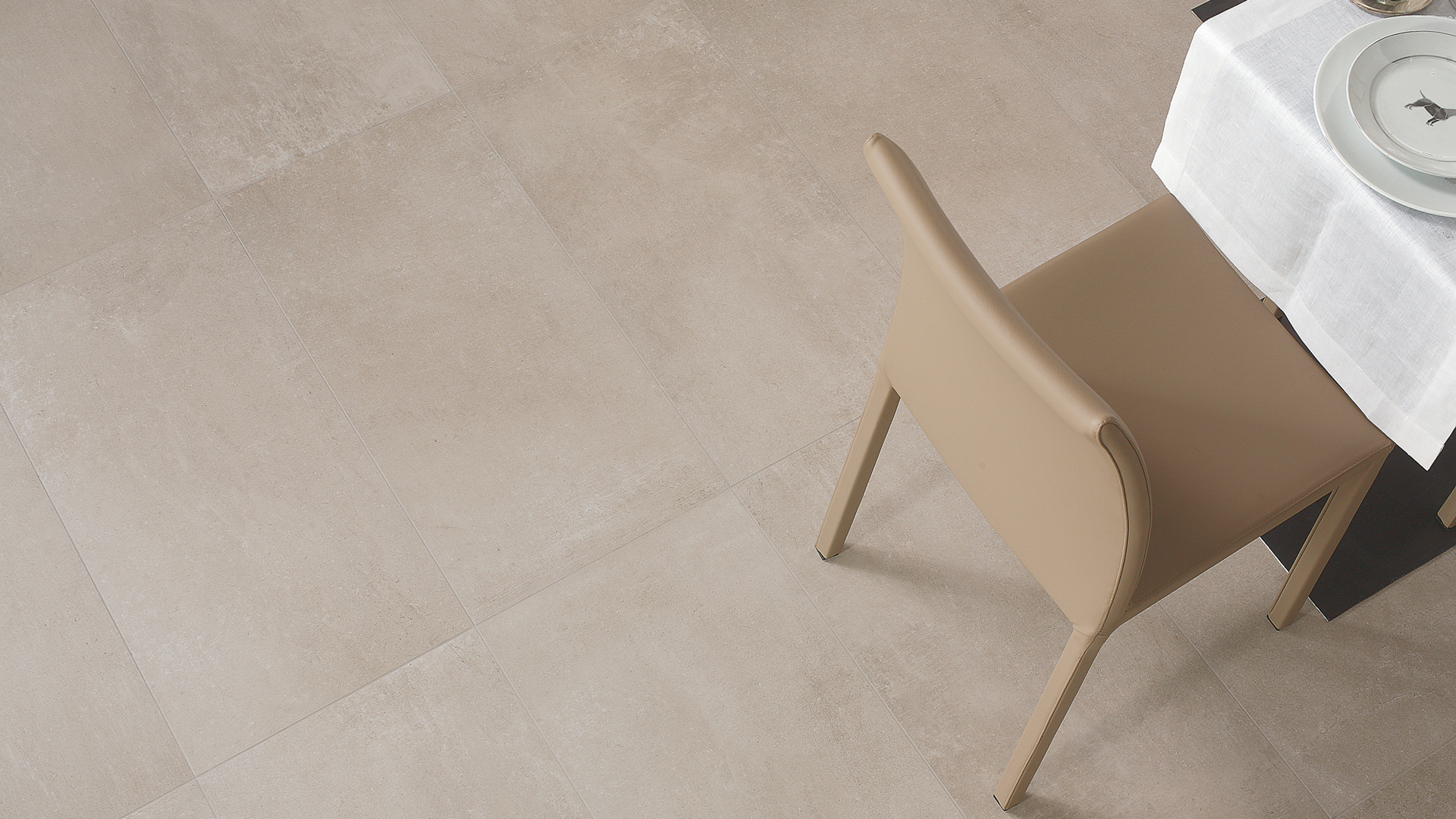 Foto: tegelvloer betonlook zandkleur