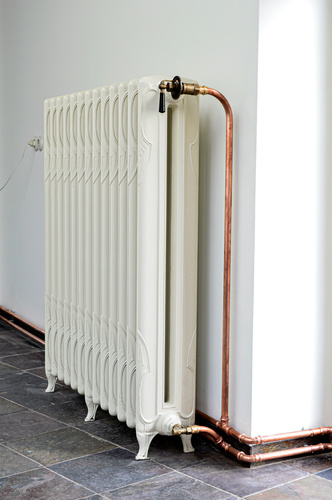 Foto: Art Deco radiator met hendel kraanset  1 