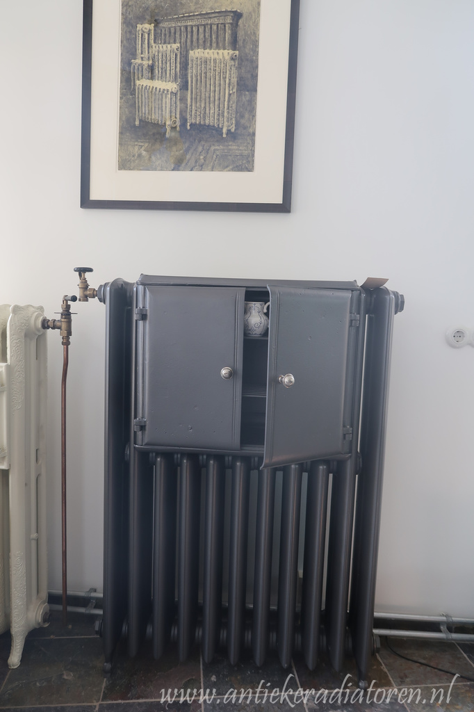 Foto: antieke bordenwarmer 7 j