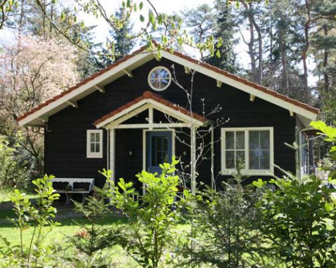 Foto : Houten recreatiewoningen