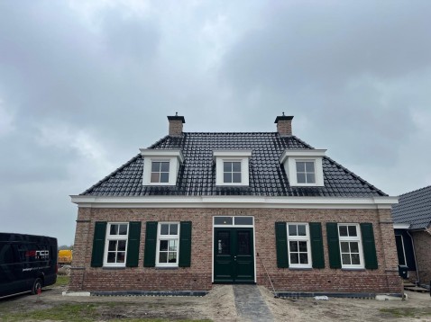 Foto : Sierlijke schoorsteenkappen als stijlvolle finishing touch