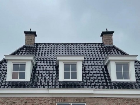 Foto : Sierlijke schoorsteenkappen als stijlvolle finishing touch
