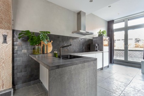 Foto : Keukentegels: hoe ver tegel je de wand?