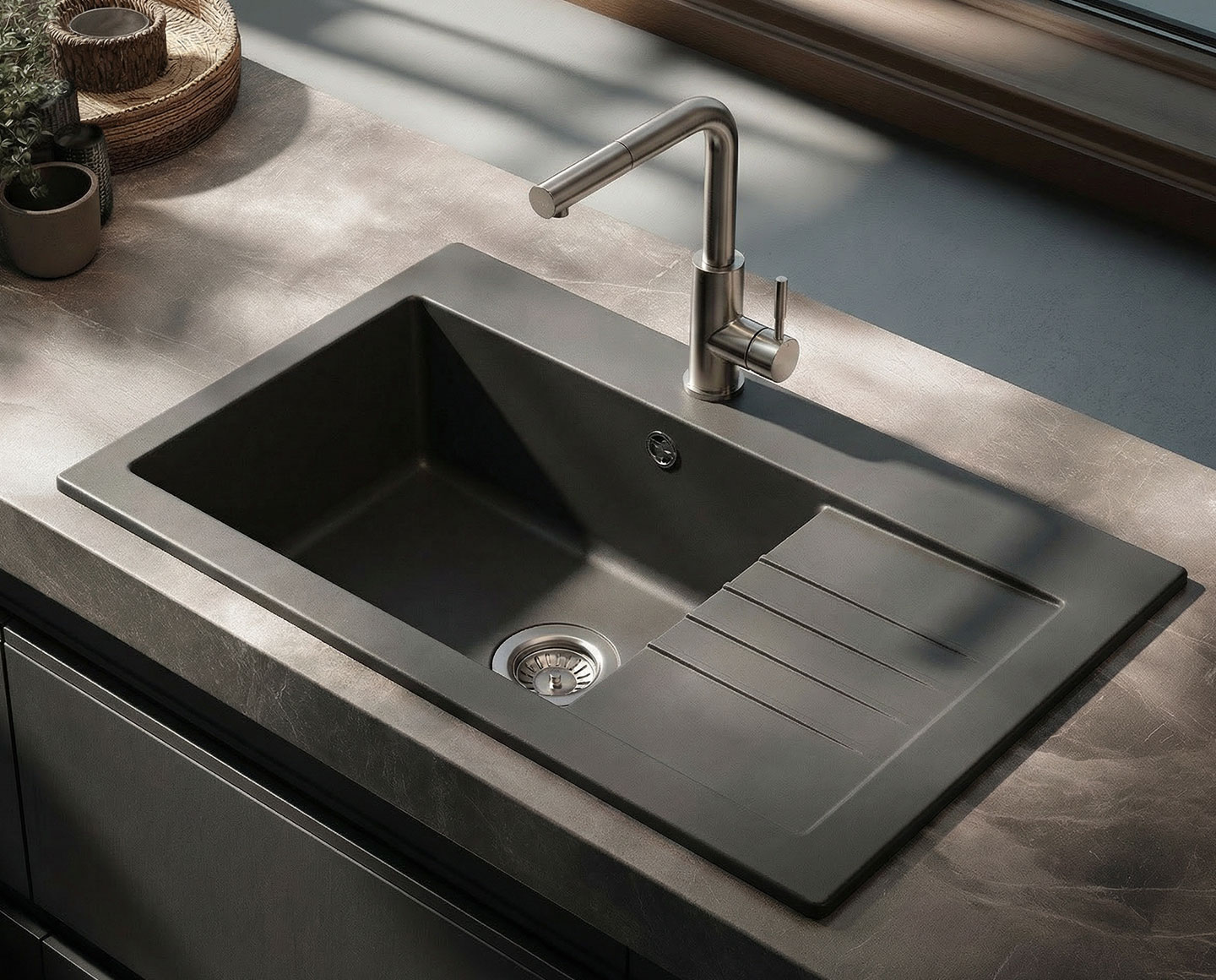 Foto : Zwarte spoelbakken 2026: de tijdloze trend voor moderne keukens