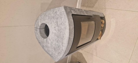 Foto : De hoekkachel RIKA Sol met 90kg witte natuursteen of speksteen