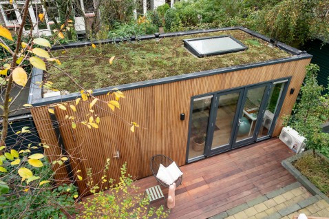 Foto : Wat kost een sedumdak op een tuinkantoor per m²?