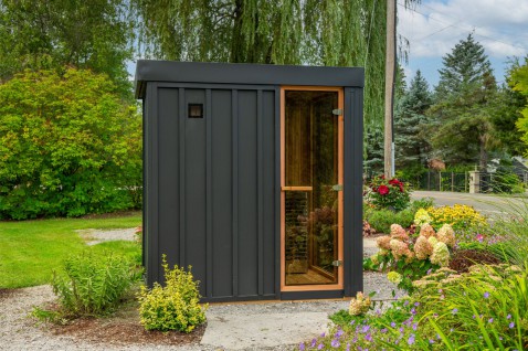 Foto : Compacte buitensauna voor kleine tuinen: luxe wellness thuis