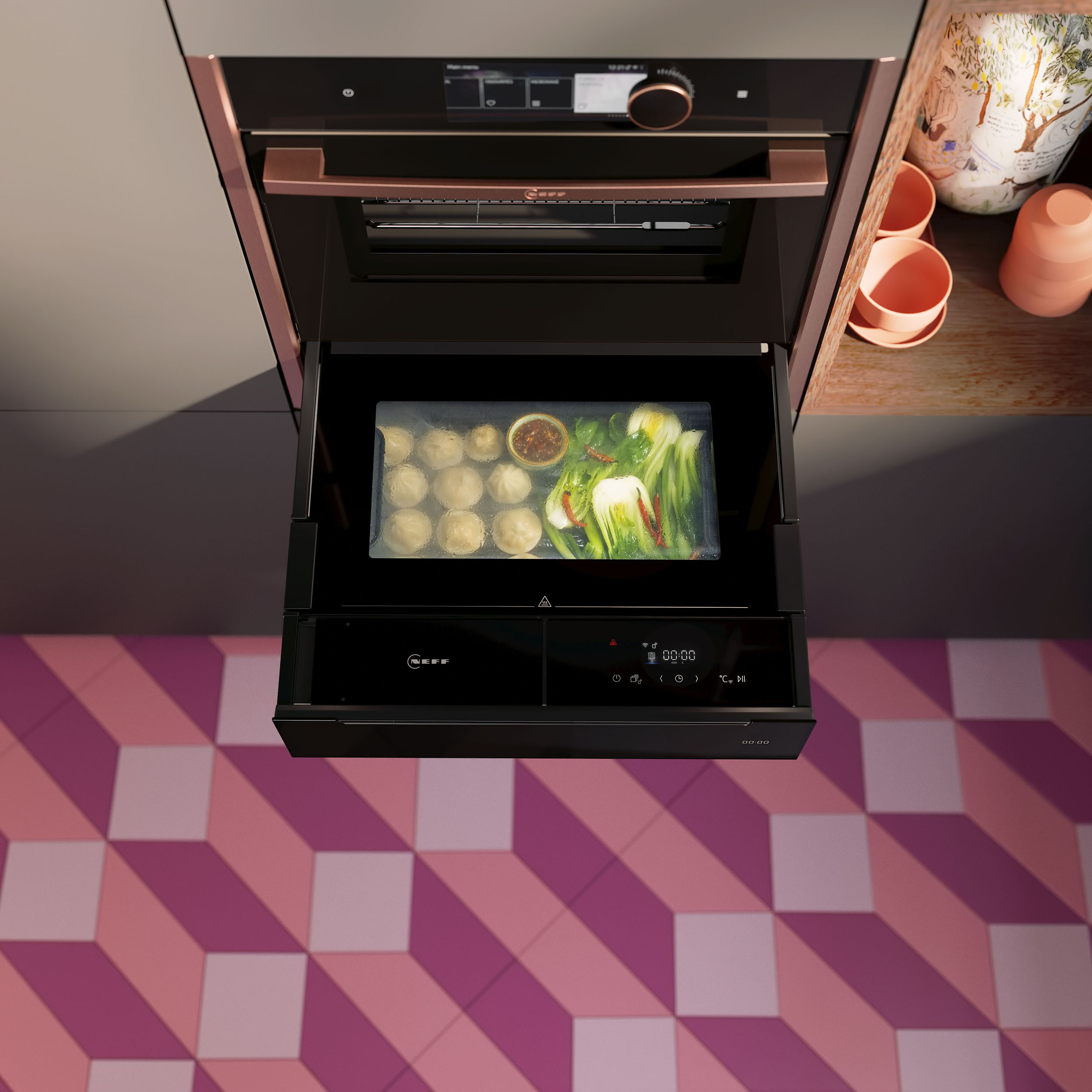 Foto: Tieleman Keukens NEFF keukenapparatuur stoomlade voor in de keuken zwart boven