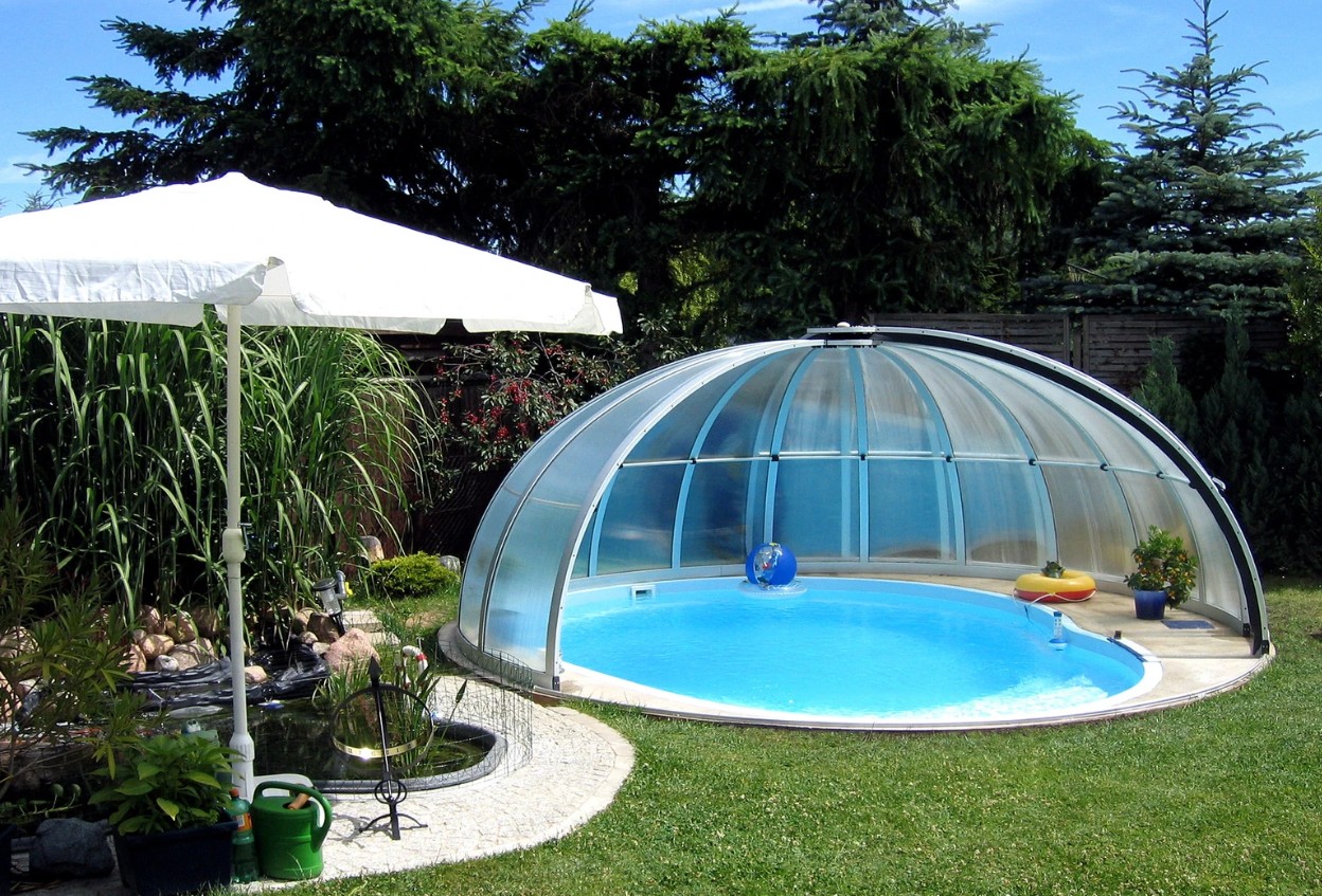 Foto : Axess Orient zwembadoverkapping: Oosterse elegantie voor uw zwembad