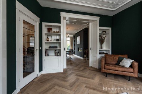 Foto : Hoe richt je een lange, smalle woonkamer gezellig in?