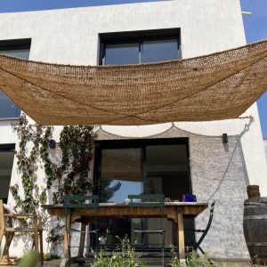 Foto: kokos schaduwdoek op terras