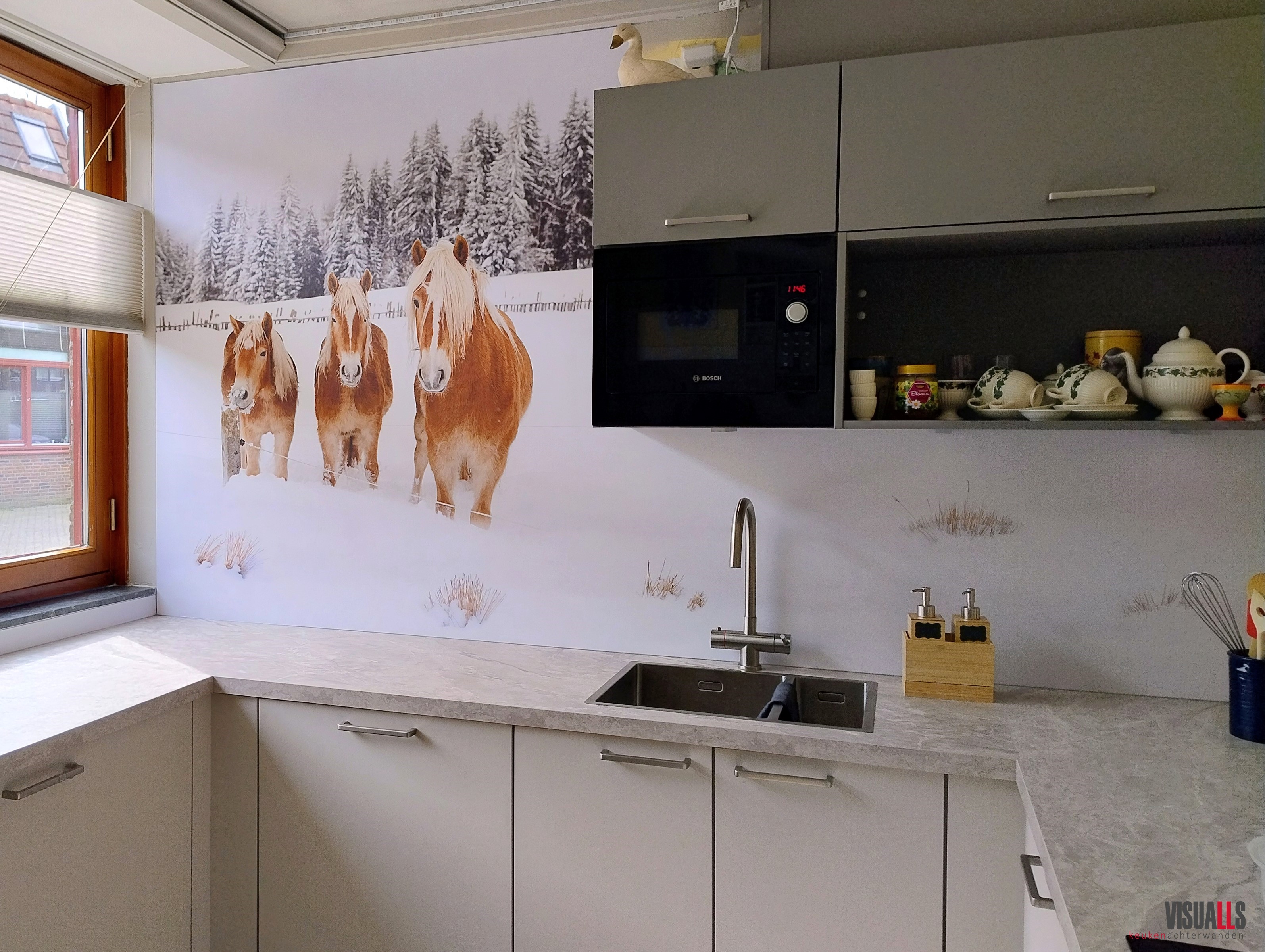 Foto: 243436PE P686 Paarden in de sneeuw logo