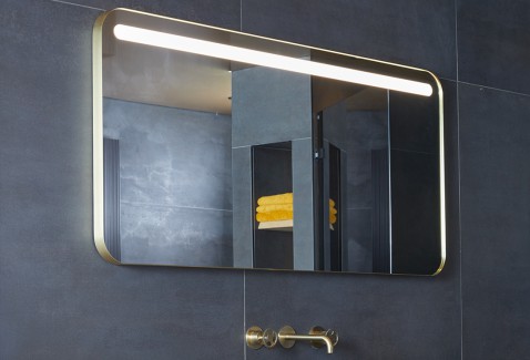 Foto : Zwarte badkamer met gouden accenten