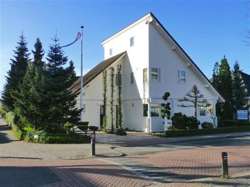 Foto: Finnlogs houtbouw landhuis met lessenaarsdak 1