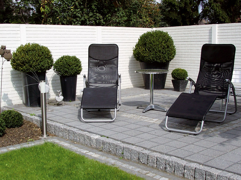 Foto: Betonschutting steen design  glad