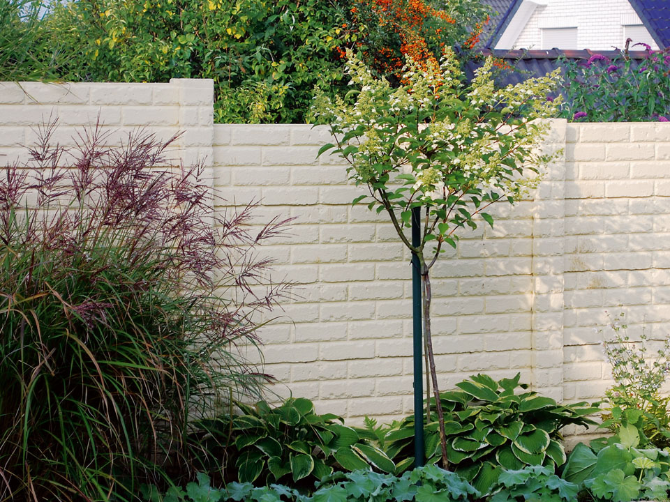 Foto: Betonschutting steen design  klassiek